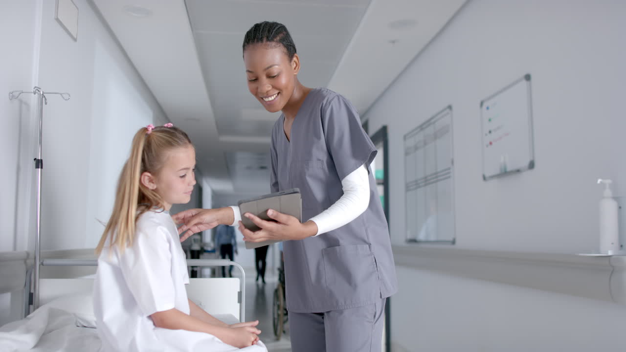 Nurse and young girl in a hospital setting