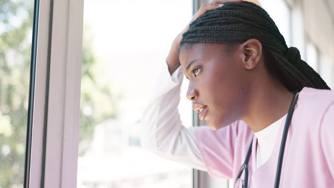 Nurse, stress thinking and hospital window