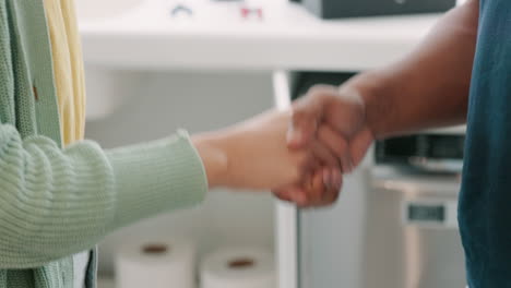 handshake, kitchen and closeup with man