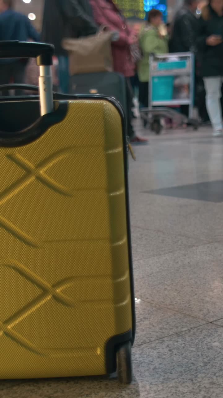 Yellow Suitcase at the Airport