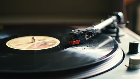 a close-up view of a vinyl record spinning on a turntable, capturing the essence of analog music. the warm ambiance invites relaxation and deep listening to classic tunes.