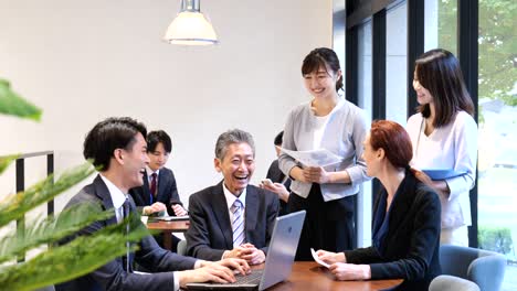 businesspersons having a meeting in an office