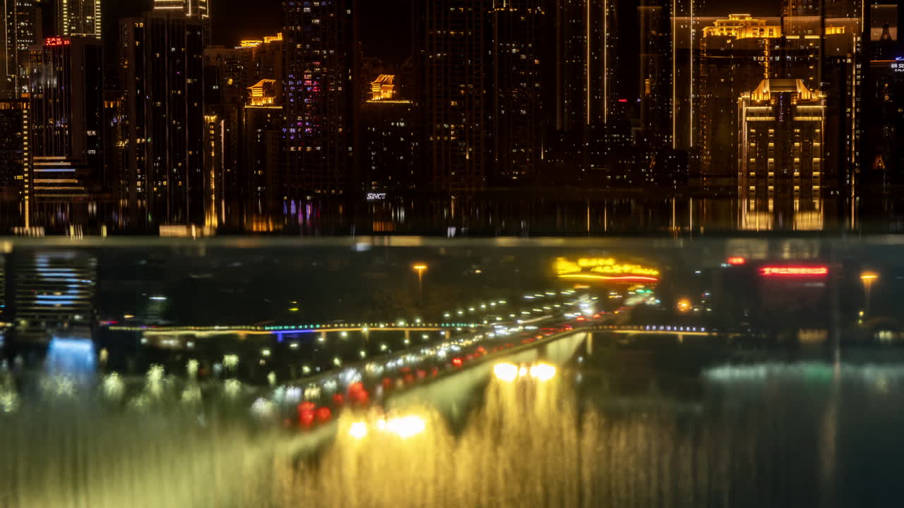 Timelapse of the amazing Chongqing cyberpunk city skyline reflected in a pool at night