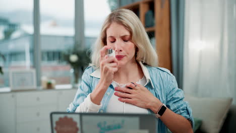 woman using asthma inhaler