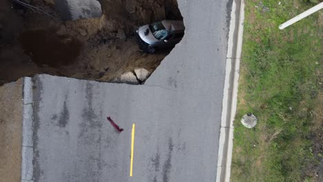 Sink-Hole-forms-in-roadway