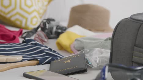 close up of open suitcase in bedroom at home being packed for summer holiday 1