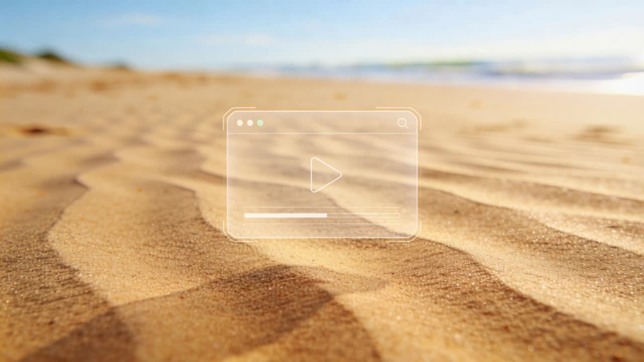 Moving low-angle camera pulling focus to sand ripples on beach, showing play overlay