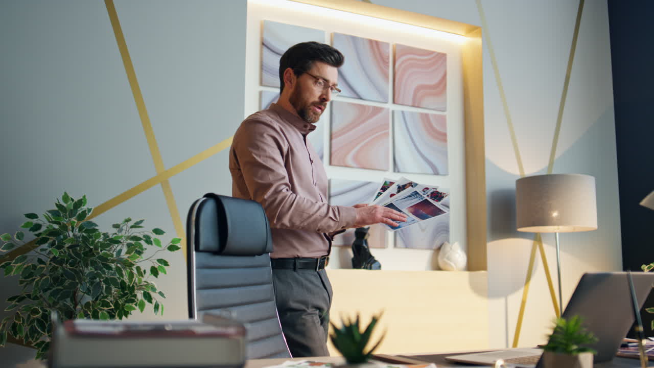 Designer presenting work online conference in office. Director showing samples.