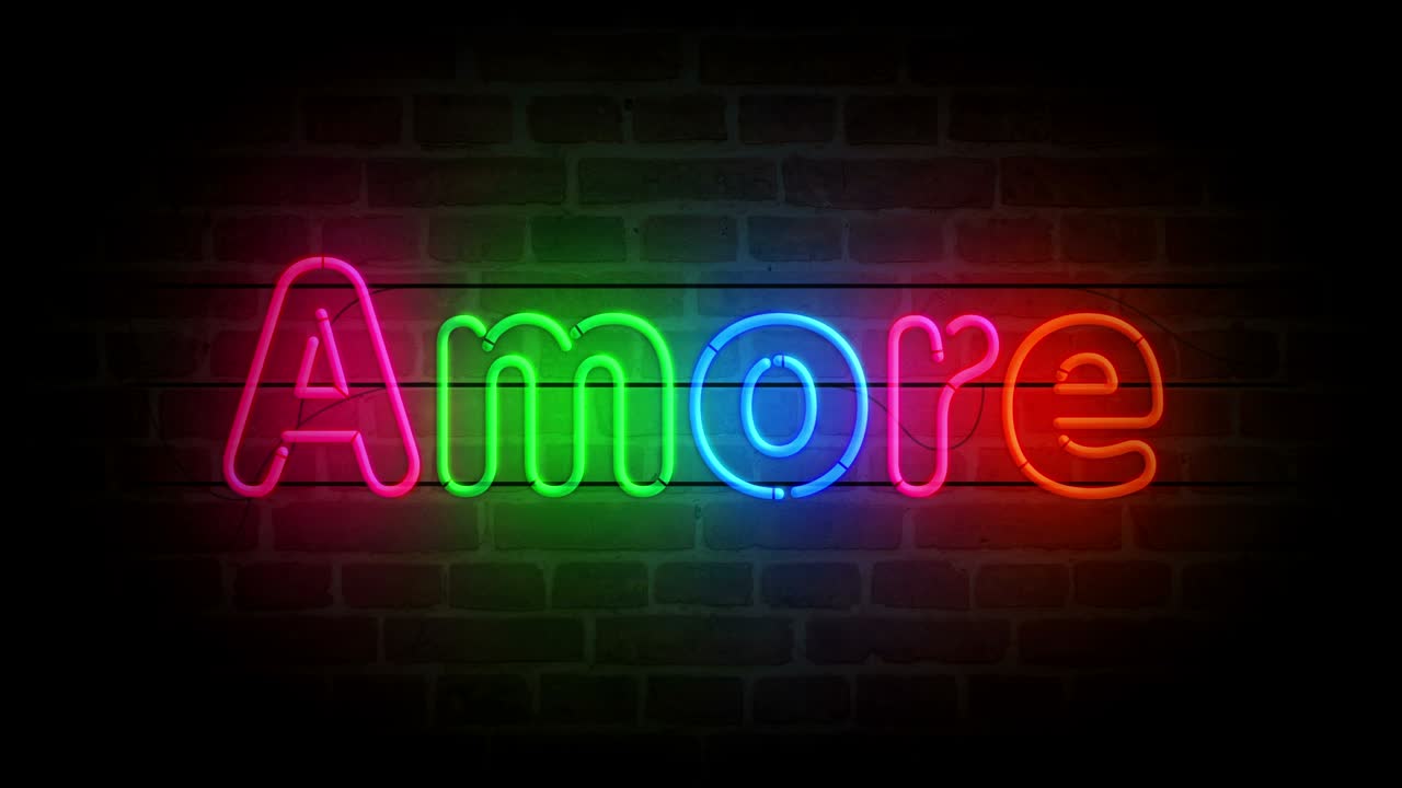 amor símbolo de amor neón en el bucle de pared de ladrillo