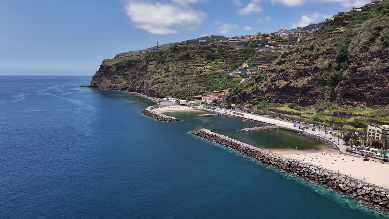 Artificial beaches at Calheta seaside resort protected by breakwaters, aerial