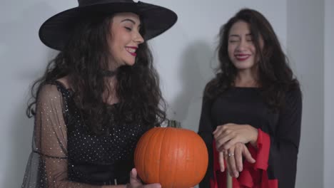 happy halloween witches with pumpkin