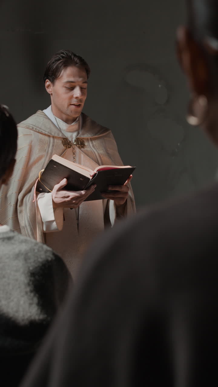 Priest reading bible