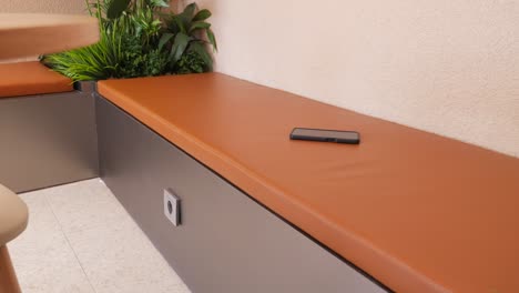 modern outdoor seating area with phone