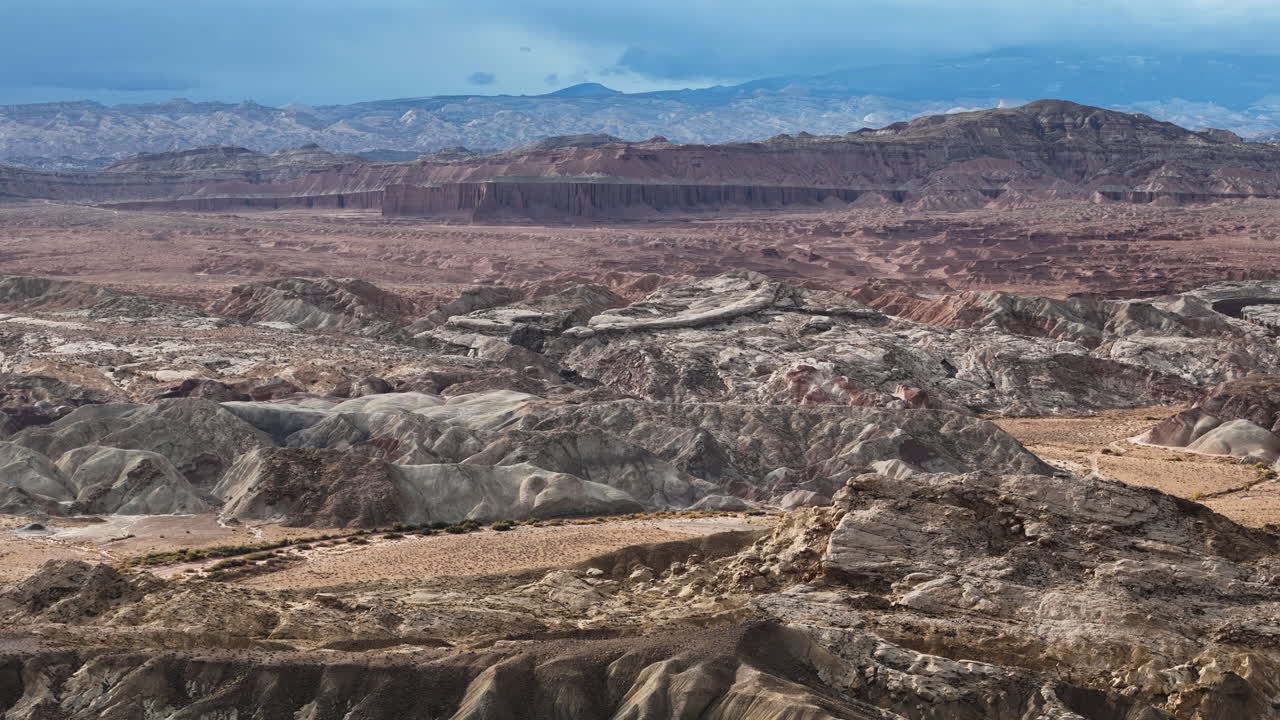 Aerial View of Lifeless Landscape, Desert Road and Barren Sandstone Hills. Utah USA
