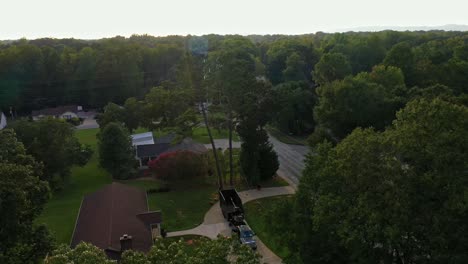 Prepping-for-Pine-Tree-Removal,-View-of-Equipment,-trailer-and-truck