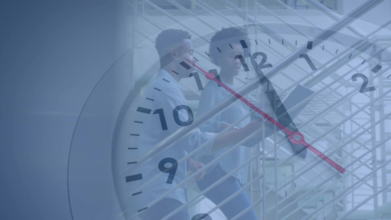 Architects exploring atrium structure using animated clock overlay and highlighting steel beams