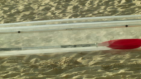 a crystal kayak on standby at the white sand beach of boracay