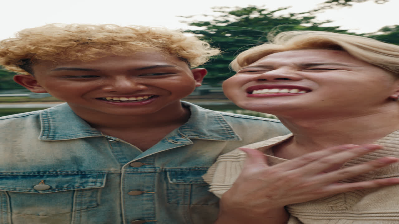 Selfie of Two People with Blonde Hair in a Park