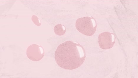 animation of pink bubbles moving and pulsating on pink distressed background