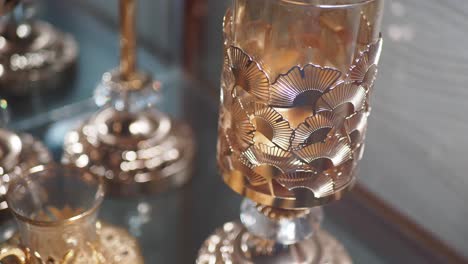 elegant gold and glass candle holders