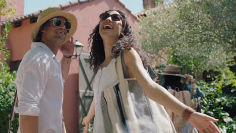 travel-couple-arriving-at-hotel-villa-with-friends-looking-at-beautiful-country-house-excited-for-holiday-tourists-enjoying-summer-vacation-together-4k-footage