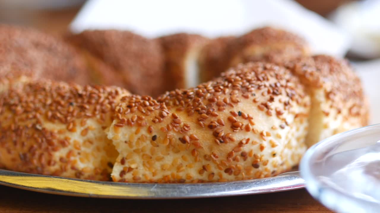 Close-up of a sesame-crusted simit
