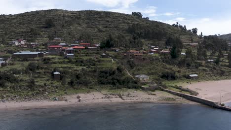 Aerial-drone-shot-of-beautiful-beach-at-the-Titicaca-lake-in-Peru