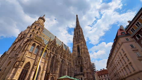 vienna, austria - june 9, 2025: tourists view st. stephen's cathedral. visitors explore the stunning architecture of saint stephen's cathedral while enjoying a sunny day in vienna, austria