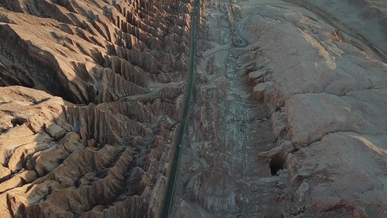 Birdseye Aerial View of Solitary Car on Highway In Atacama Desert, Chile