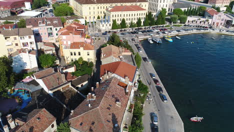 aerial drone shot of an old city in croatia at the sea, 4k uhd