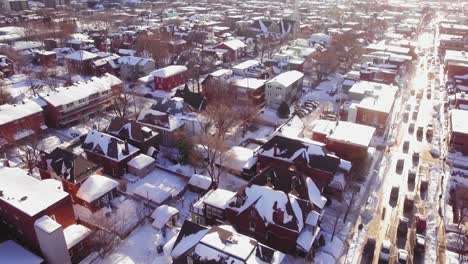 gorgeous raising aerial shot of a snow covered center-town suburb in ottawa, ontario, canada