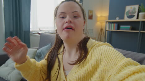 pov of girl with down syndrome chatting on online video call