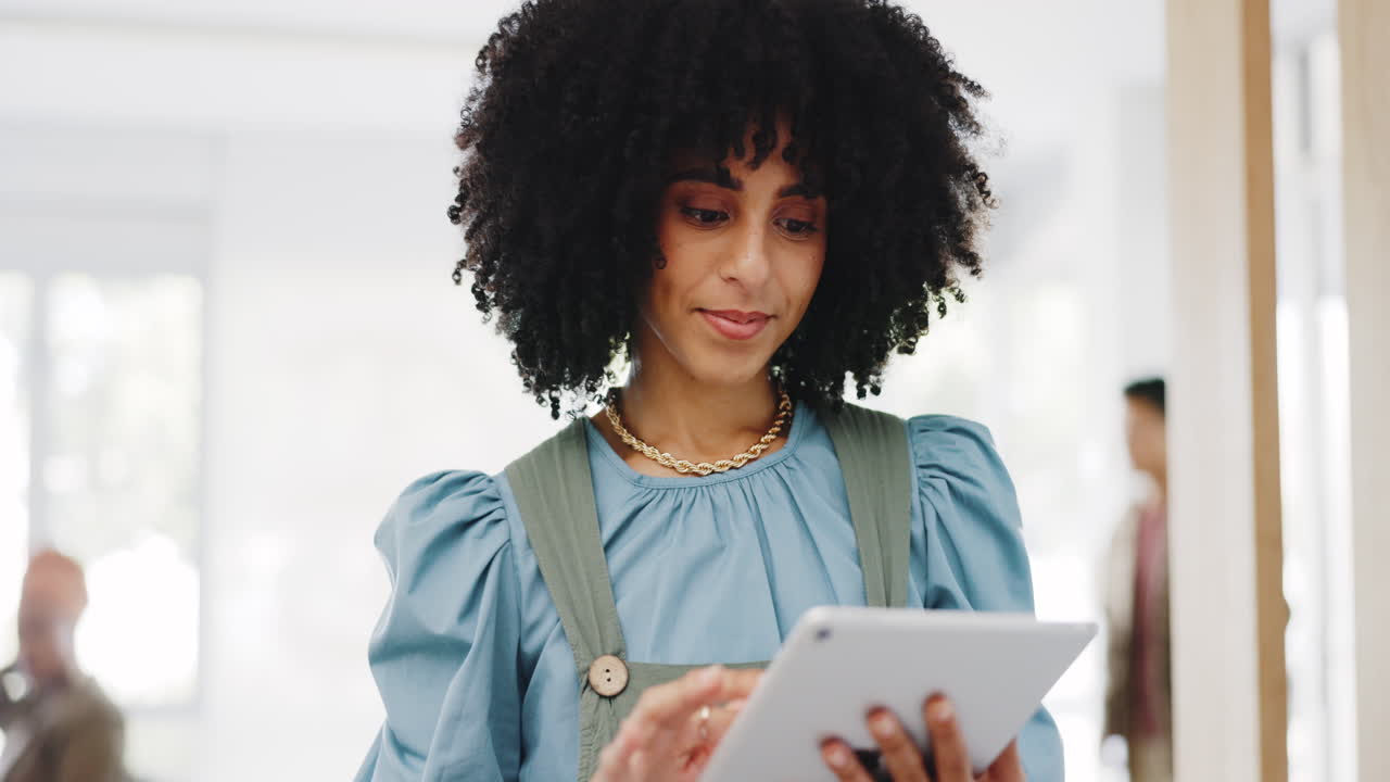 Woman using tablet in office