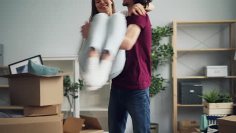 happy couple moving in