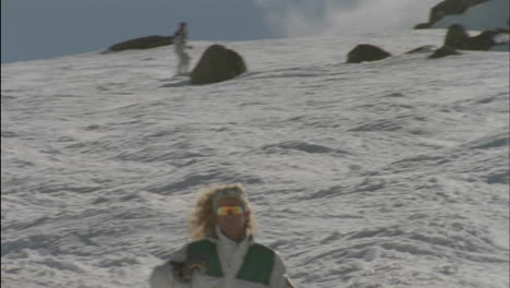 a person skies down a slope