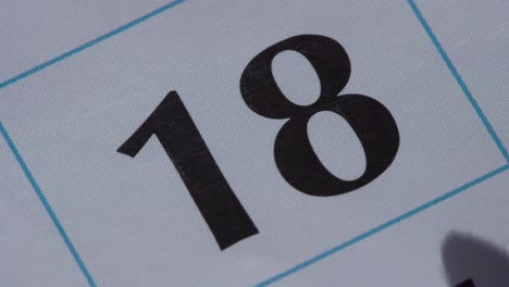 marking the date in the calendar with a red marker