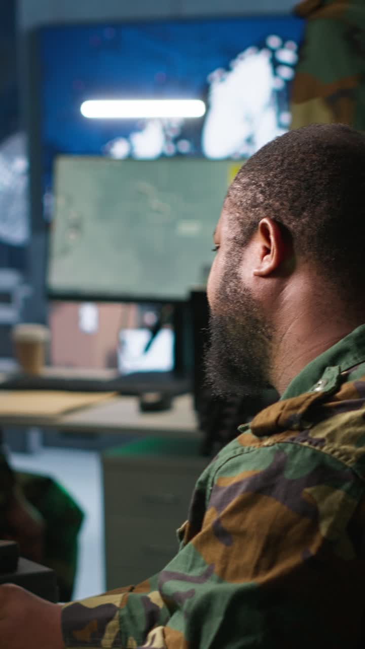Vertical video Soldier doing tasks in military base, using radar, intercepting rockets