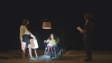 stage performance featuring a wheelchair-bound actress