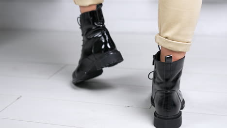 woman's black leather boots