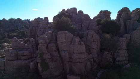 Aerial-left-tracking-shot-of-nature-reserve-at-El-Torcal-de-Antequera,-Malaga,-Andalusia,-Spain