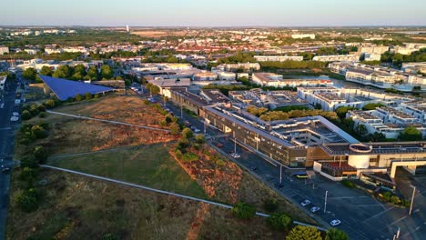 approaching drone movement to the la rochelle university with public park on beautiful cityscape, la rochelle, charente-maritime, france