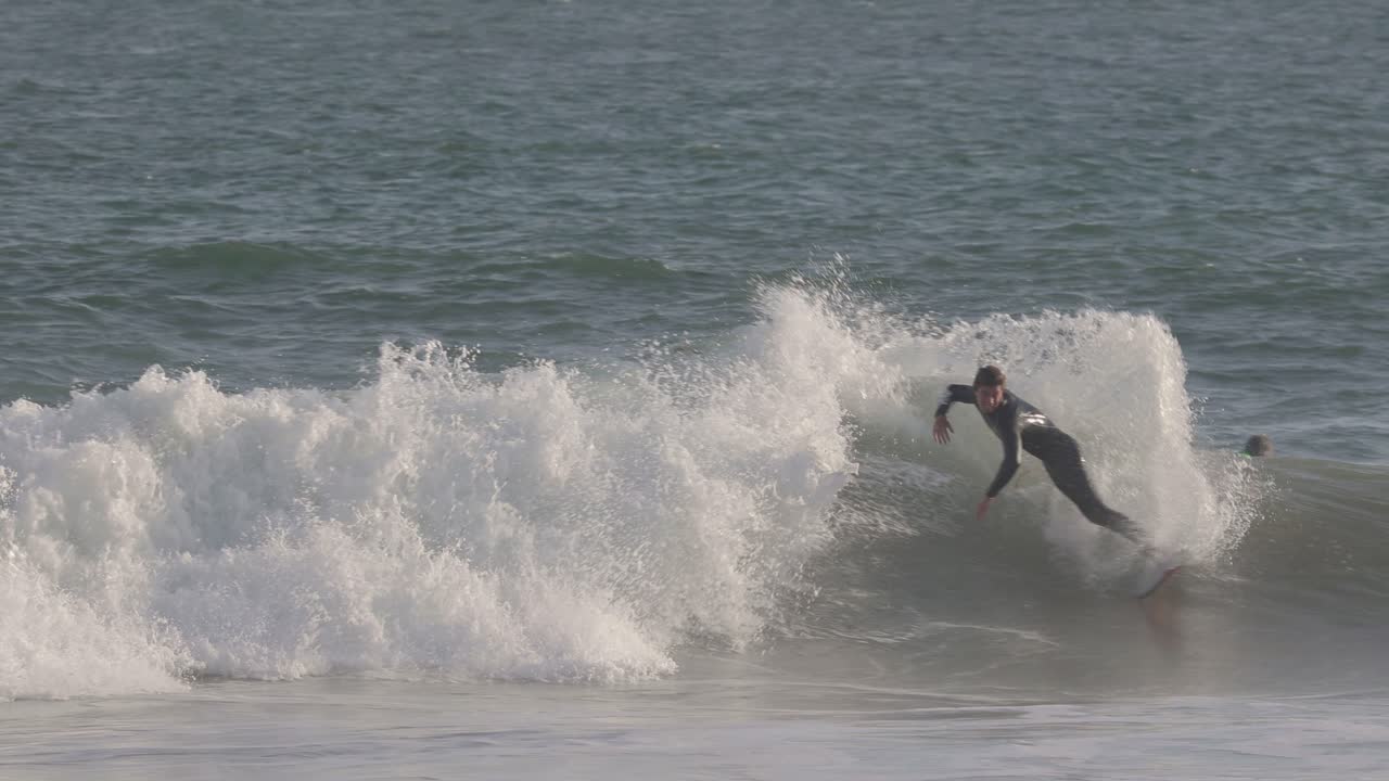 A lot of water on sky with a strong and powerful surf, Carcavelos, Cascais