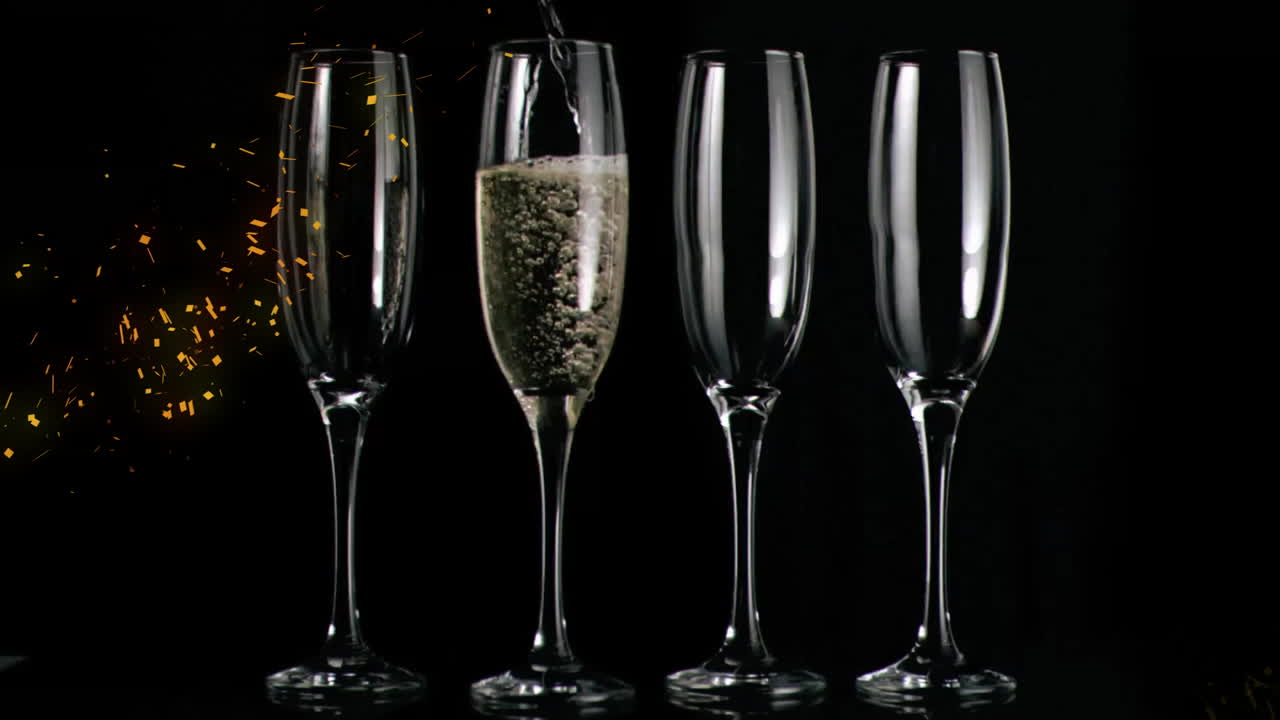 Animation of glasses of champagne and fireworks on black background