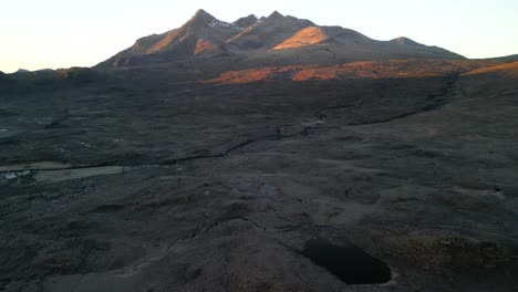 flying towards black cuillin mountains at sunrise at sligachan on the isle of skye scotland