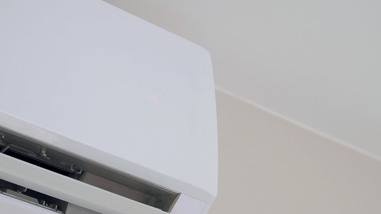 Close-up of a wall-mounted air conditioner display
