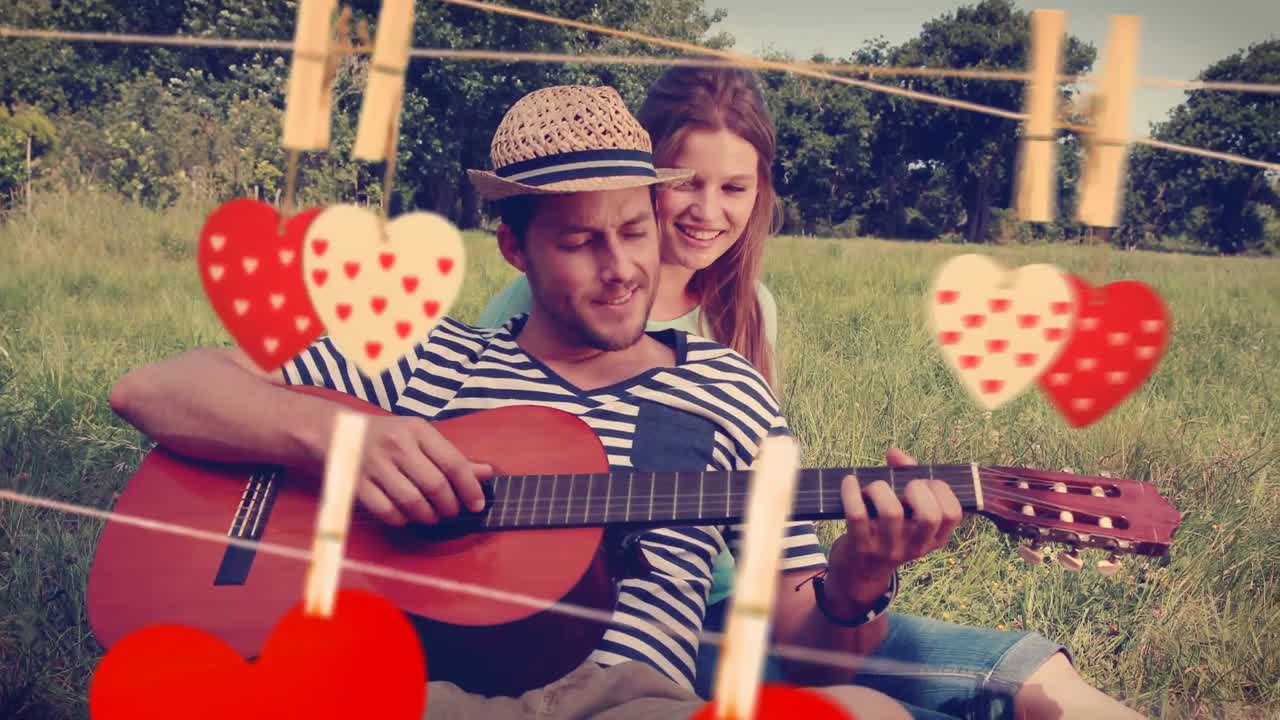 발렌타인 데이에  ⁇ 은 날에 여자친구를 위해 기타를 연주하는 남자친구