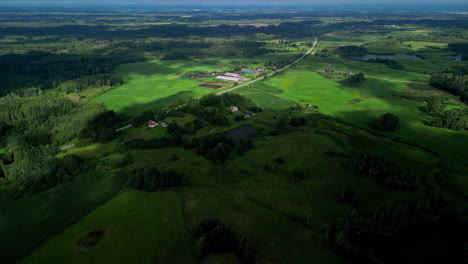 overlooking the green countryside with soft cloud shadows drifting across the fields