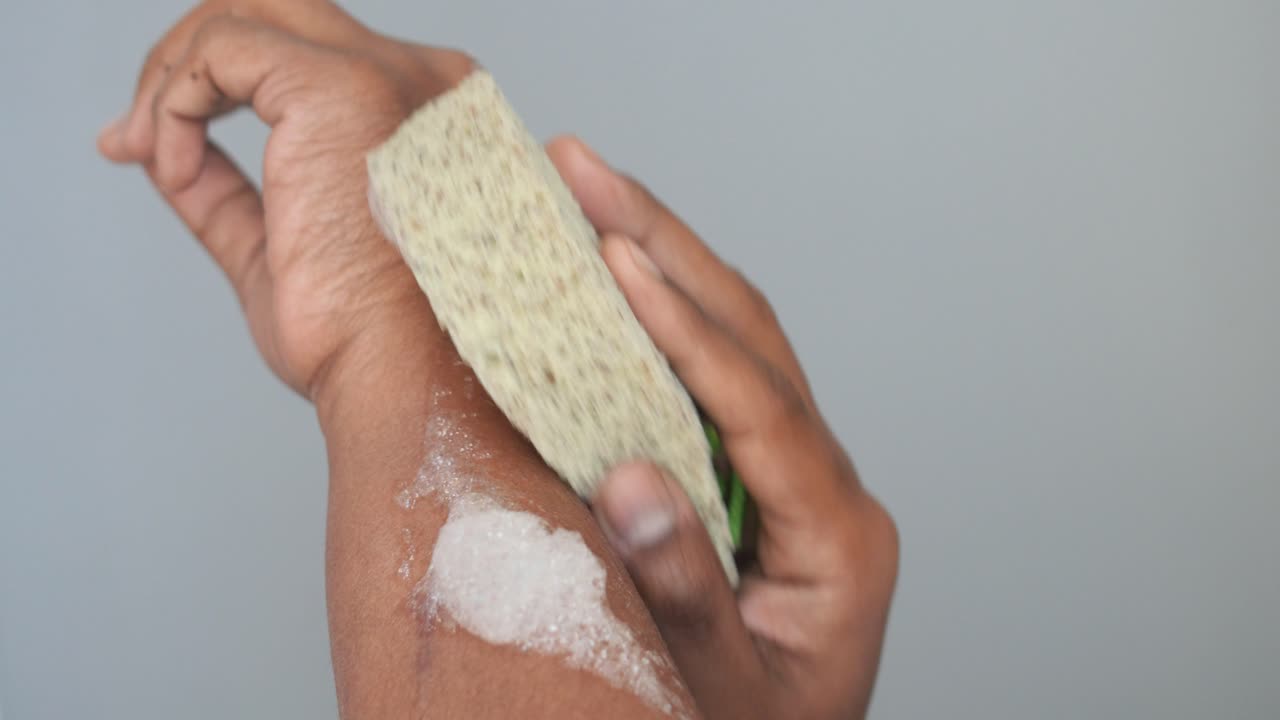 Washing arm with sponge and soap