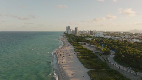 people relaxing on miami beach, florida