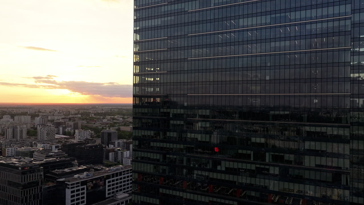 Modern Buildings In The Business District Of Warsaw At Sunset In Poland. Aerial Close-up Shot